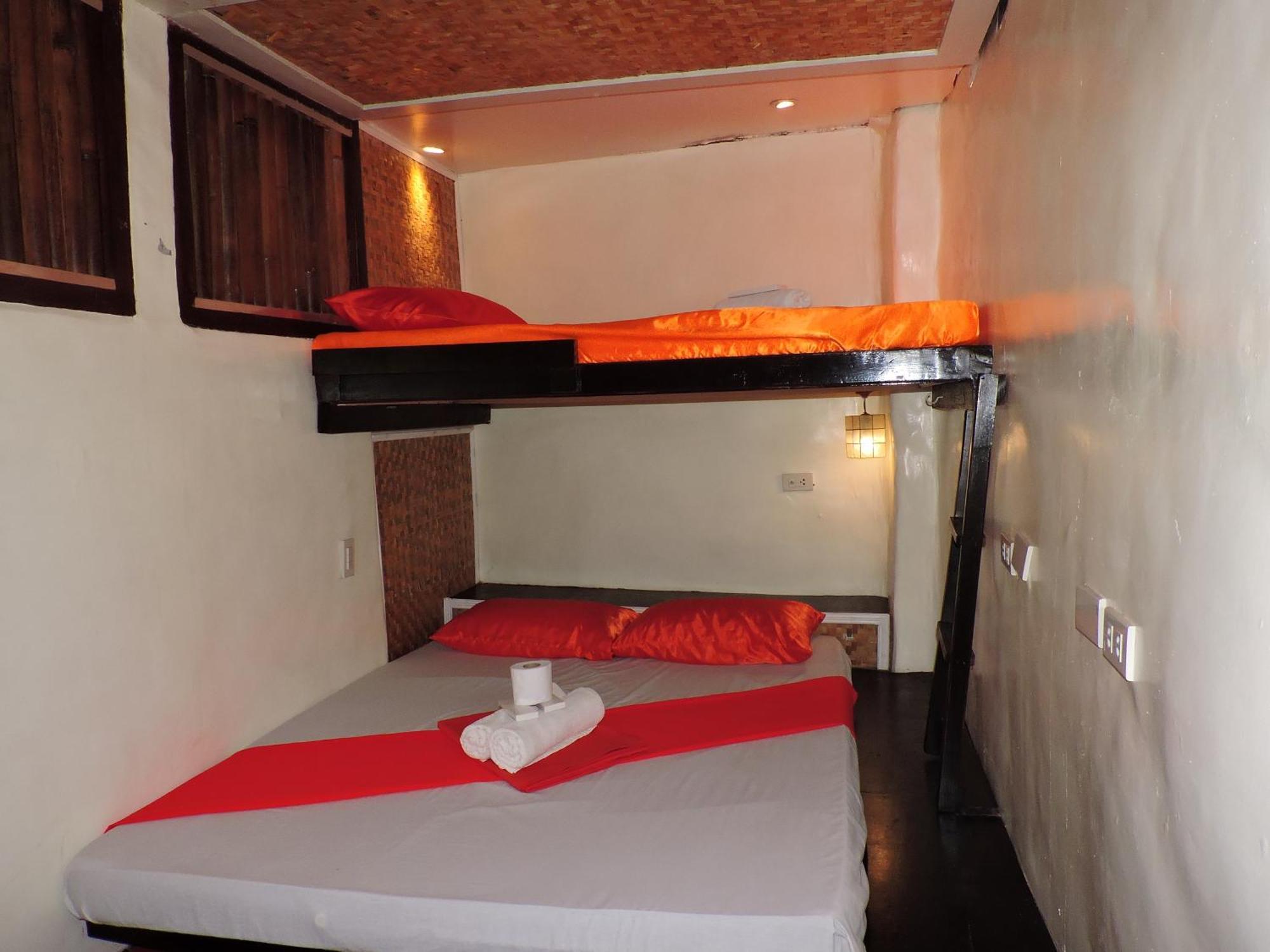 Orange Mangrove Pension House By Sms Hospitality Puerto Princesa Room photo