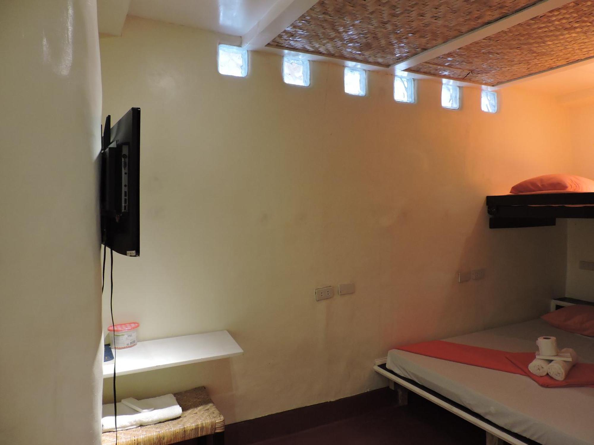 Orange Mangrove Pension House By Sms Hospitality Puerto Princesa Room photo
