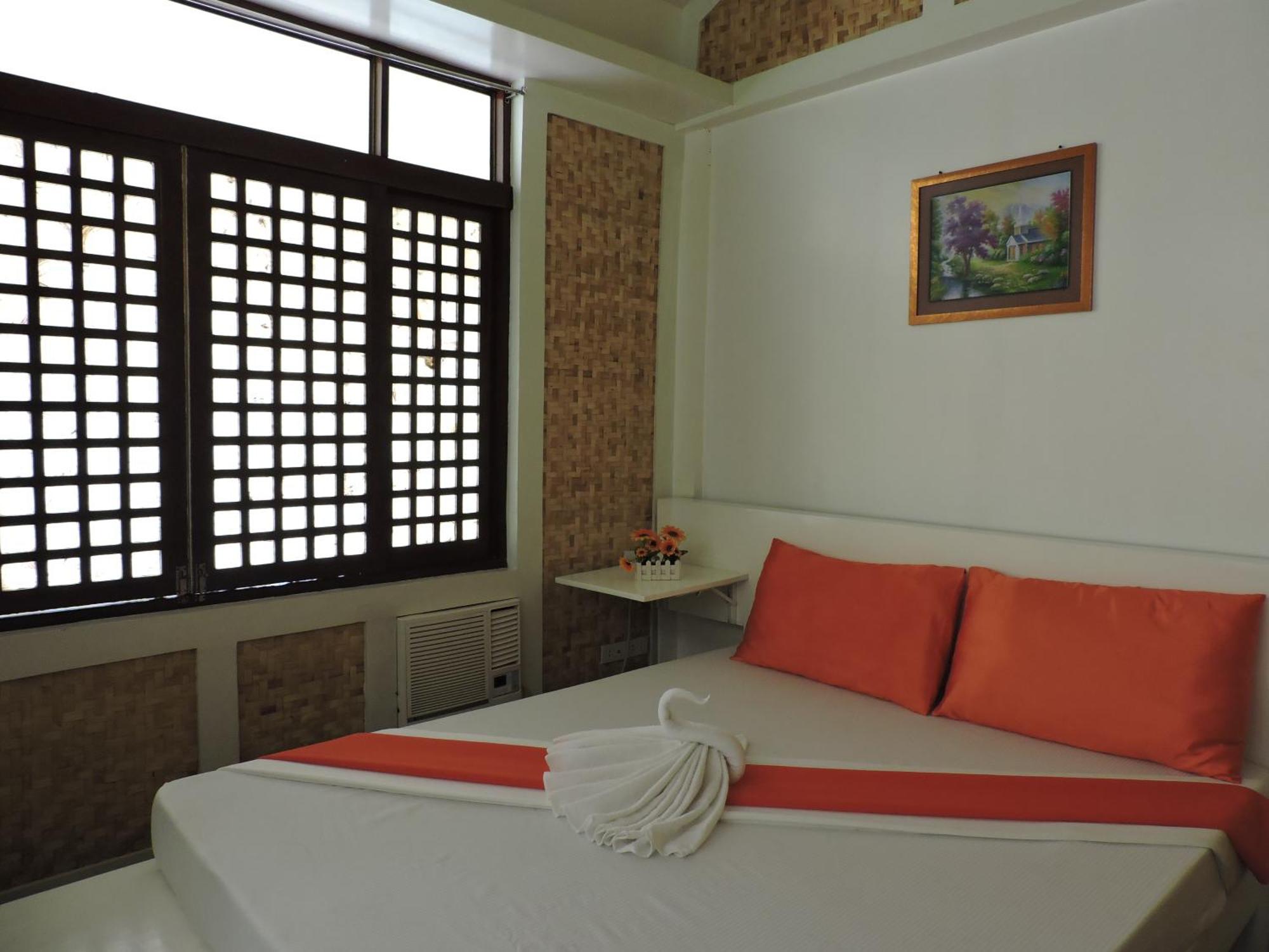 Orange Mangrove Pension House By Sms Hospitality Puerto Princesa Room photo